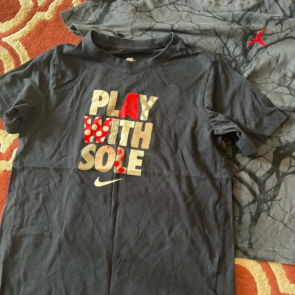 2 kids Nike tees